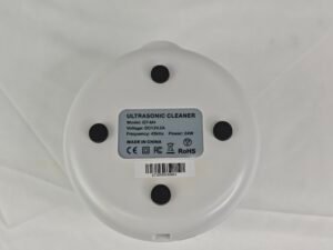 GT-M4 ultrasonic cleaner product label showing model, input, frequency, power and conformity symbols