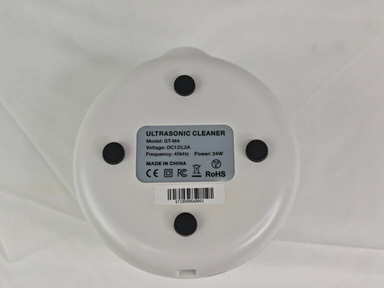 GT-M4 ultrasonic cleaner product label showing model, input, frequency, power and conformity symbols
